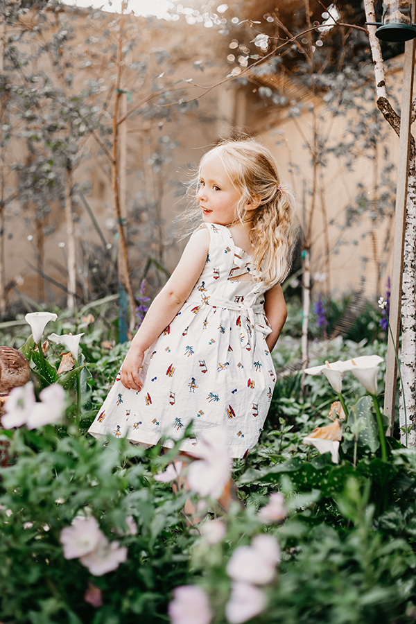 girl in pretty dress turning around